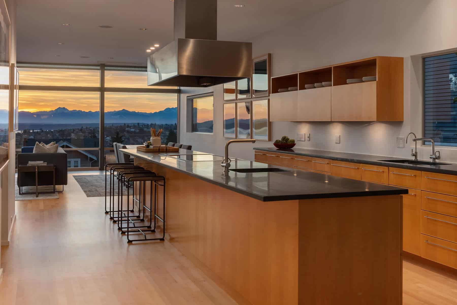 Chef's kitchen with Olympic Mountain views at 1948 7th Ave W, Queen Anne — Sold by Elev8 Realty Group
