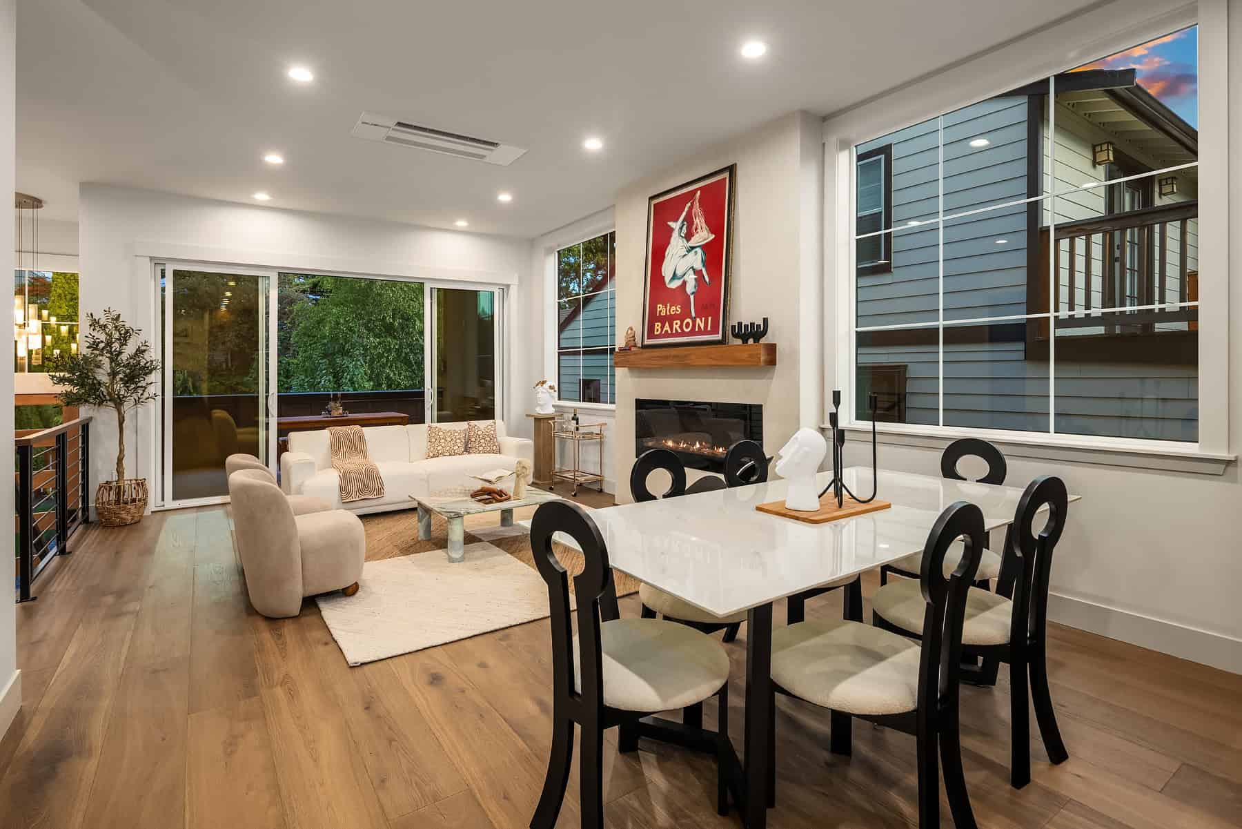 Living room and covered terrace at 2029 42nd Ave E, Madison Park - Sold by Elev8 Realty Group