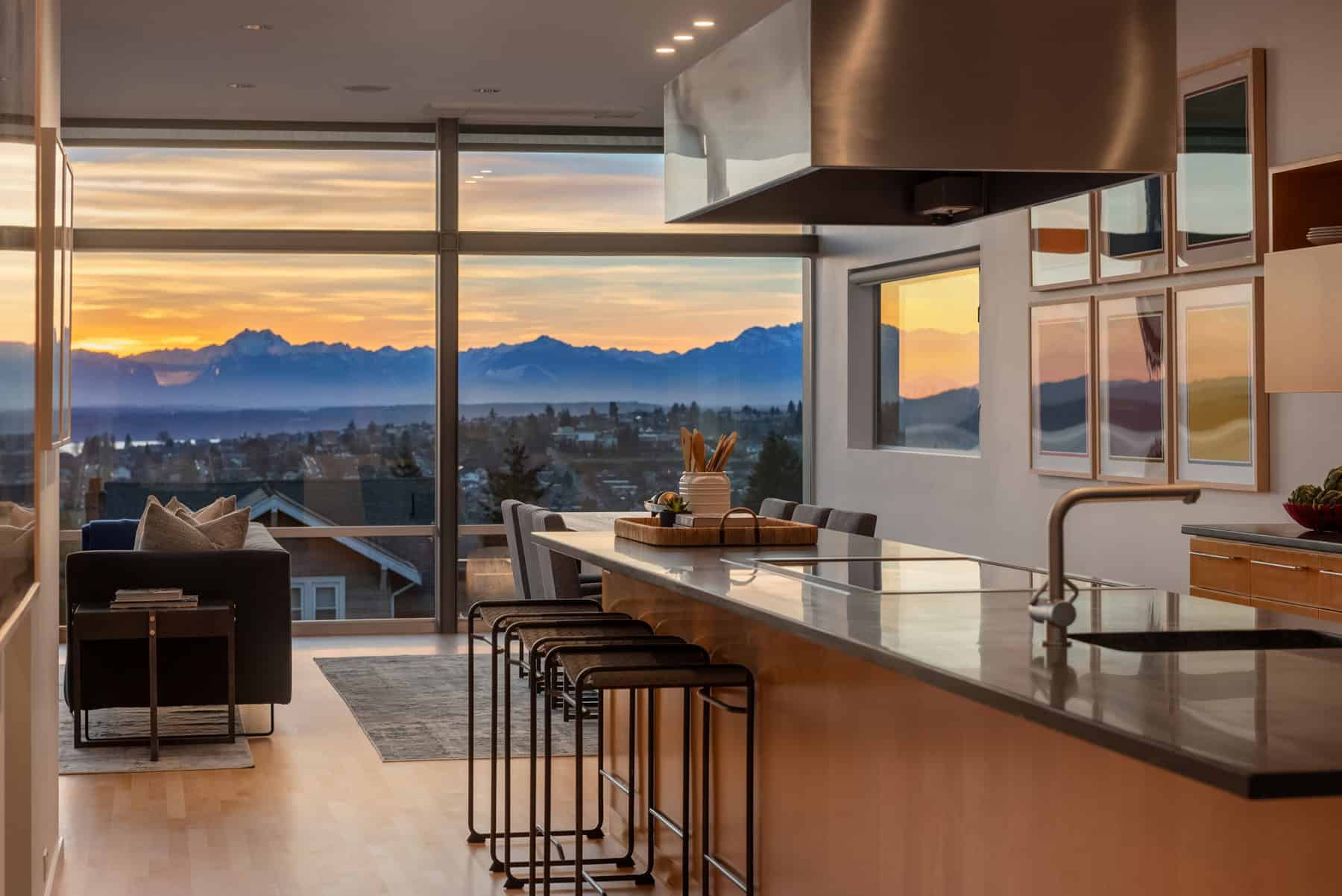 Dining room and kitchen with Olympic Mountain views at 1948 7th Ave W, Queen Anne — Sold by Elev8 Realty Group