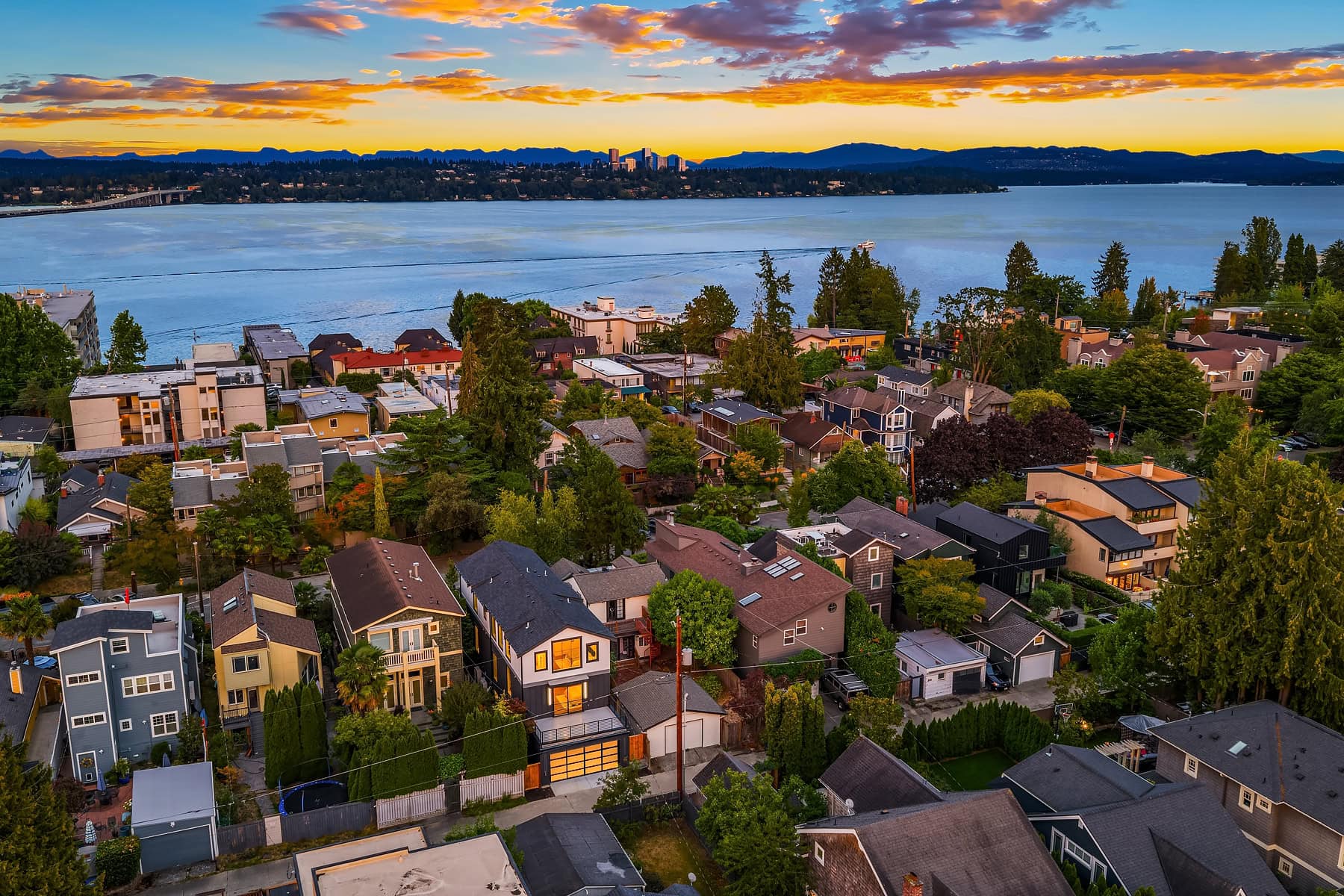 Aerial view over Lake Washington and Bellevue at 2029 42nd Ave E, Madison Park - Sold by Elev8 Realty Group