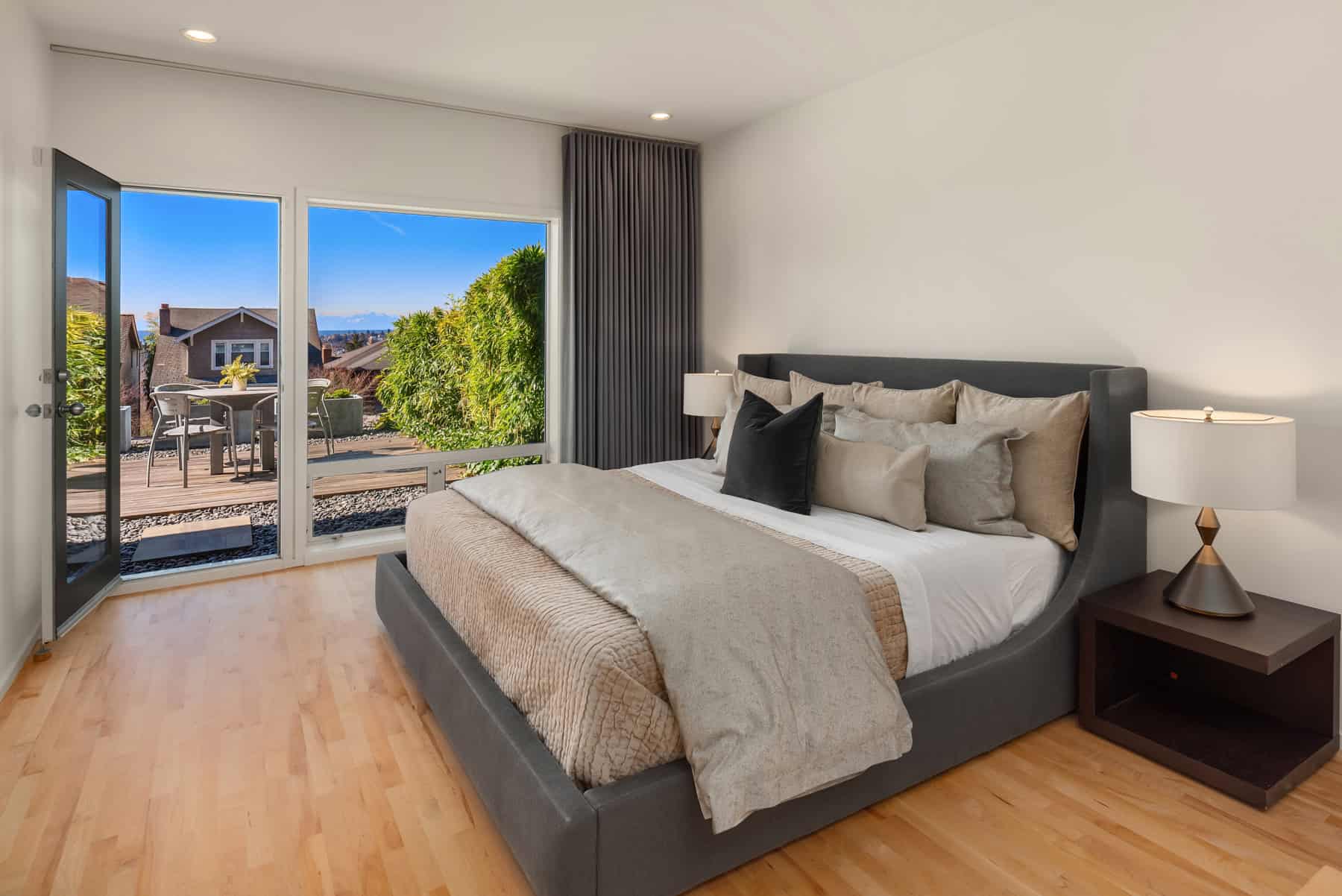 Primary bedroom with private terrace at 1948 7th Ave W, Queen Anne — Sold by Elev8 Realty Group