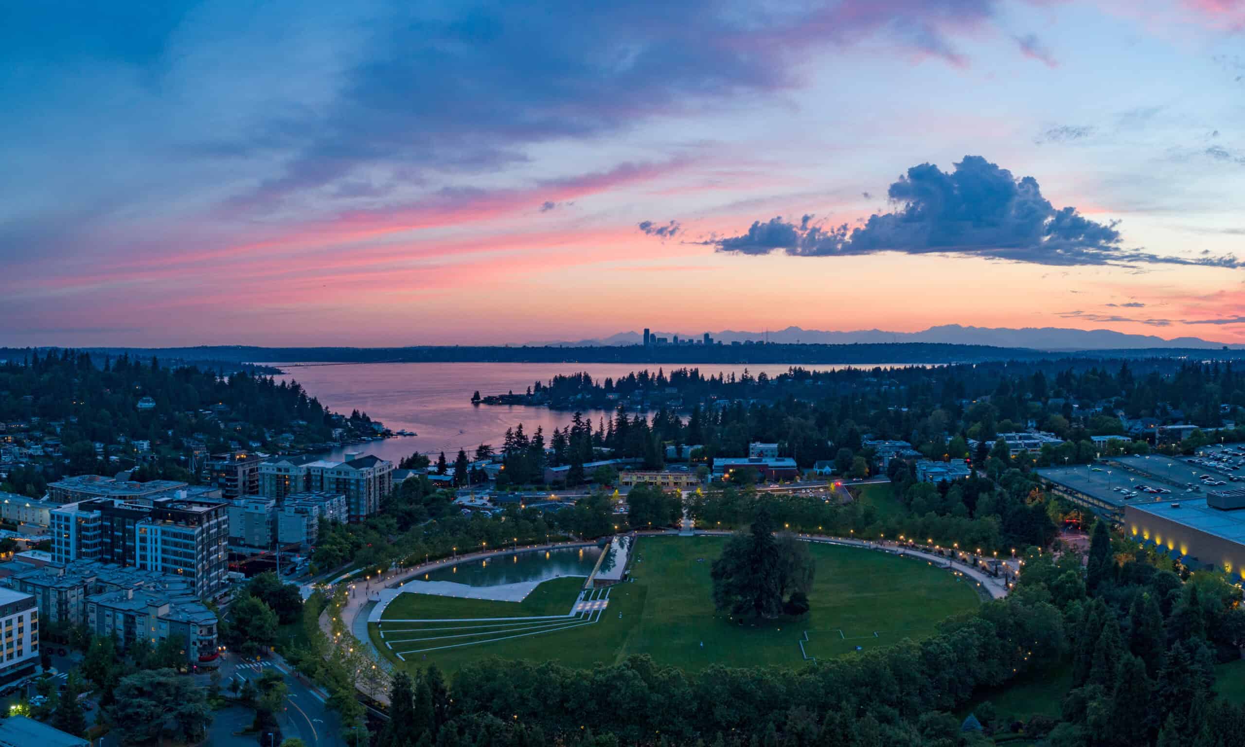 Bellevue Downtown Park aerial view at sunset with Seattle skyline beyond