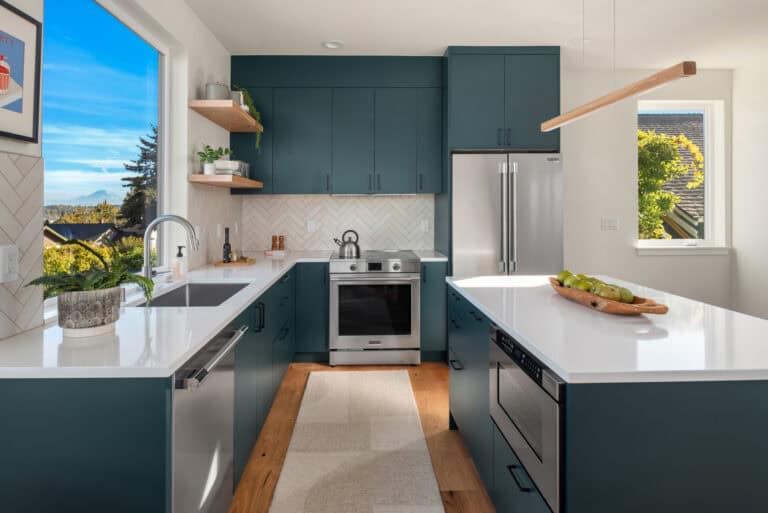 3821 36th Ave SW Unit B kitchen with stainless appliances, new construction by Upper Left Living in West Seattle